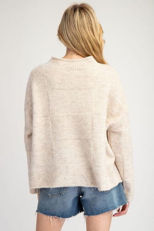 Check neutral mock neck sweater