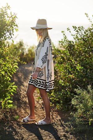 Black/white abstract print front tie dress