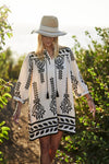 Black/white abstract print front tie dress