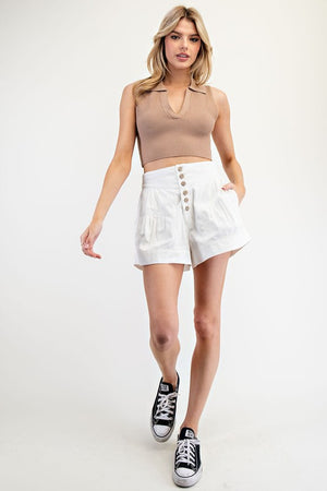 White pleated button down shorts