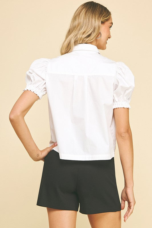 White shirt, small hole as pictured White shirt, small hole as pictured