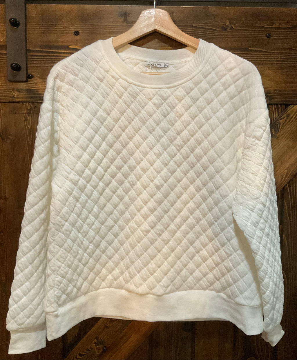 Crew neck quilted knit top