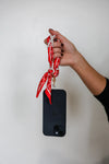 Victory Lap Woven Scarf Pearl Phone Strap/Wristlet - Burnt Orange
