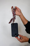 Victory Lap Woven Scarf Pearl Phone Strap/Wristlet - Maroon