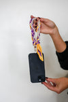 Victory Lap Woven Scarf Pearl Phone Strap/Wristlet - Purple & Gold