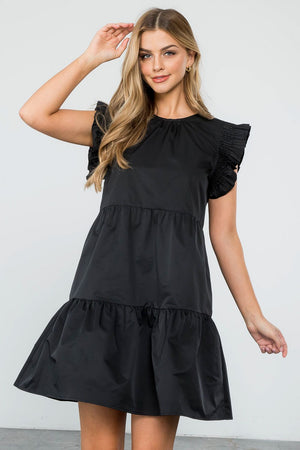 Tiered black mini dress
